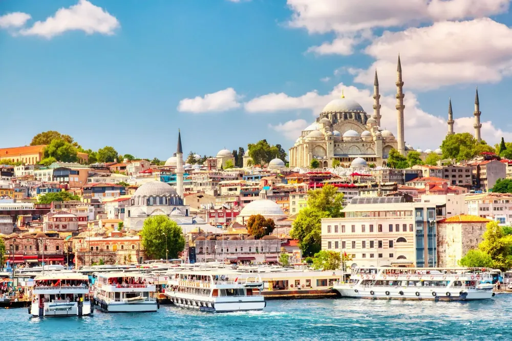 Sightseeing ships in Istanbul set against the city skyline